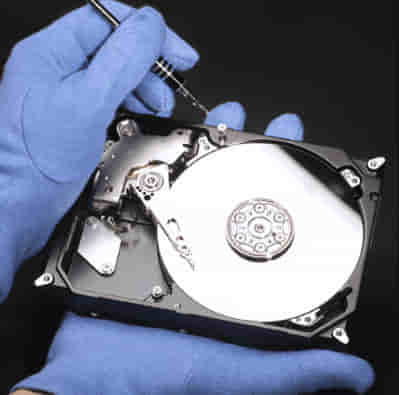 Hard drive shredding for secure data destruction ensuring safe disposal, data security compliance, and certified e-waste recycling by Erevival