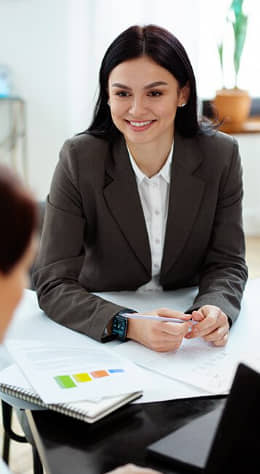 eRevival expert consulting client about electronics recycling and data destruction FAQs